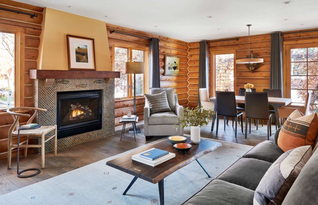 A log cabin open floor plan with the dining and living room