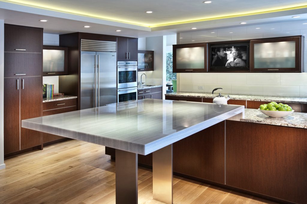 A unique dual-kitchen island in an upscale kitchen