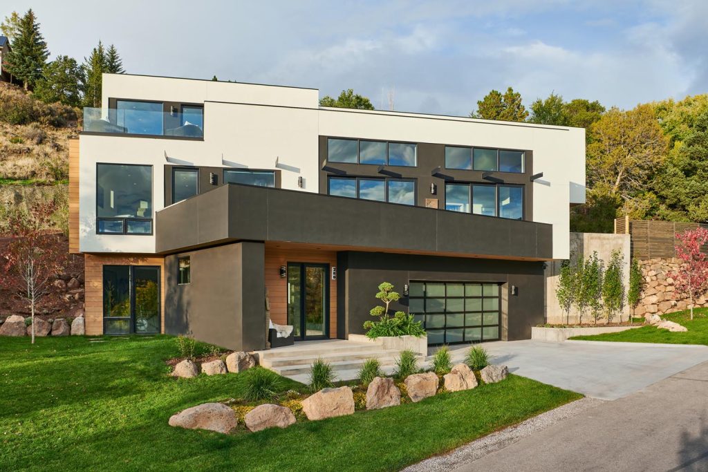 A very modern, contemporary-looking black and white custom home