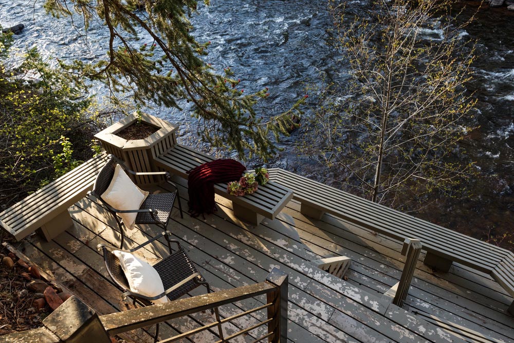 A view of the custom deck built overlooking a creek