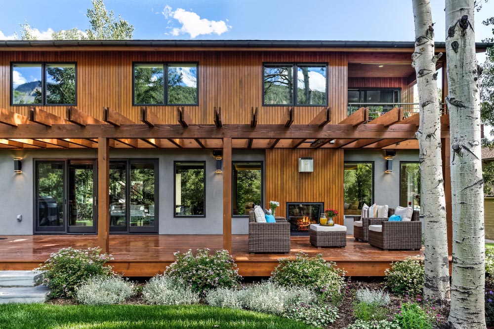 The back porch of a home with outdoor seating options