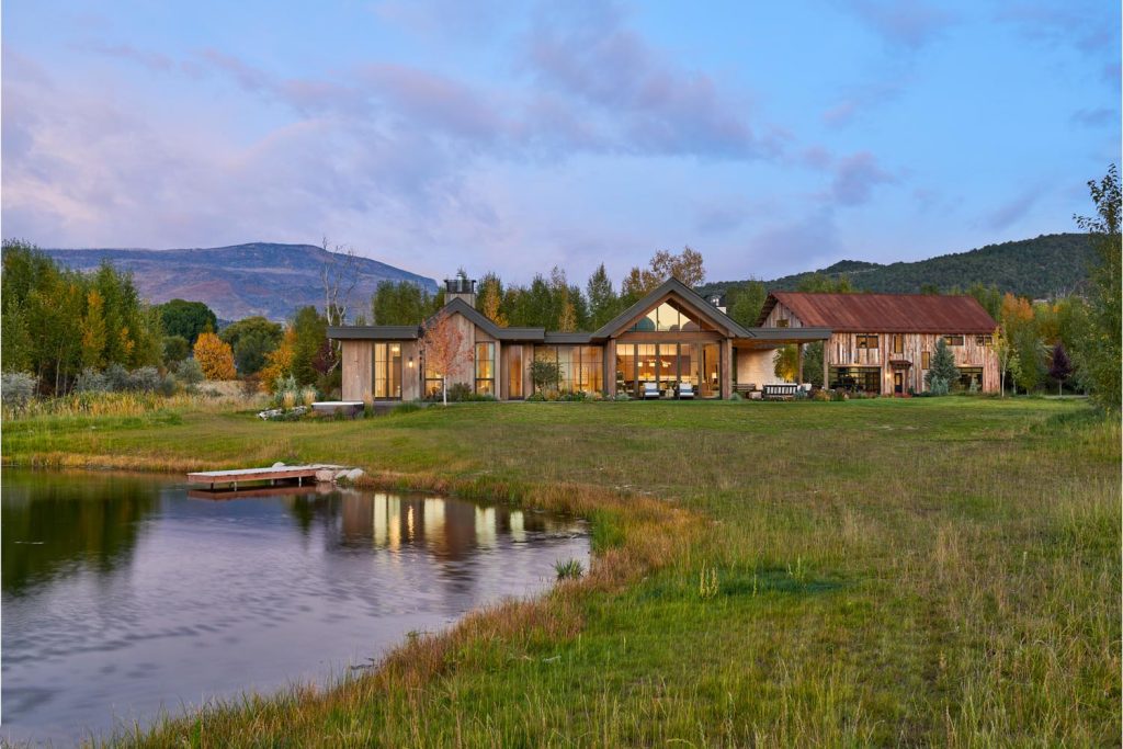 A modern luxury home with an outdoor kitchen