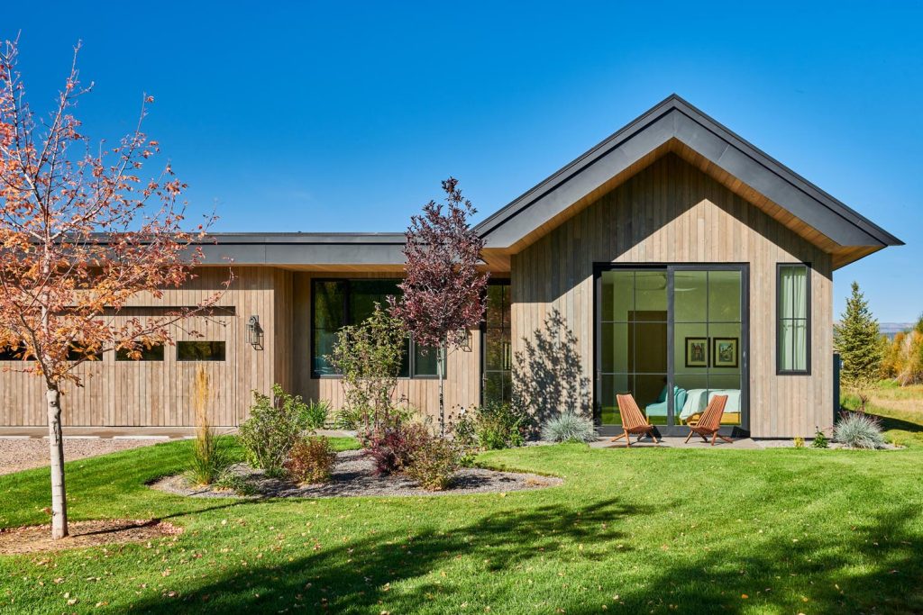 The back patio and garage of a custom cottage