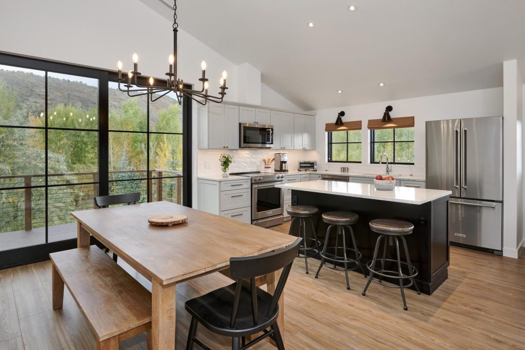 A luxury kitchen with island seating