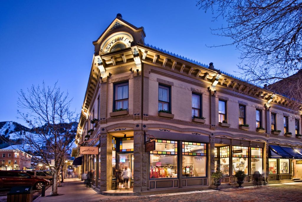 A street corner boutique with custom stained glass windows