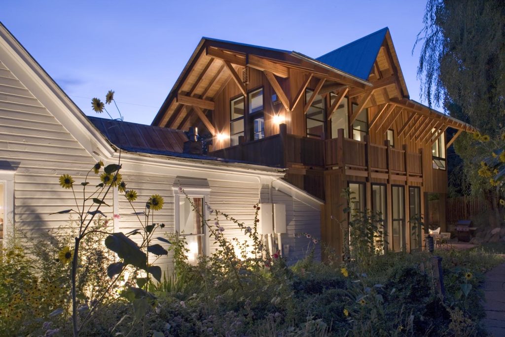 A charming log cabin attached to another building
