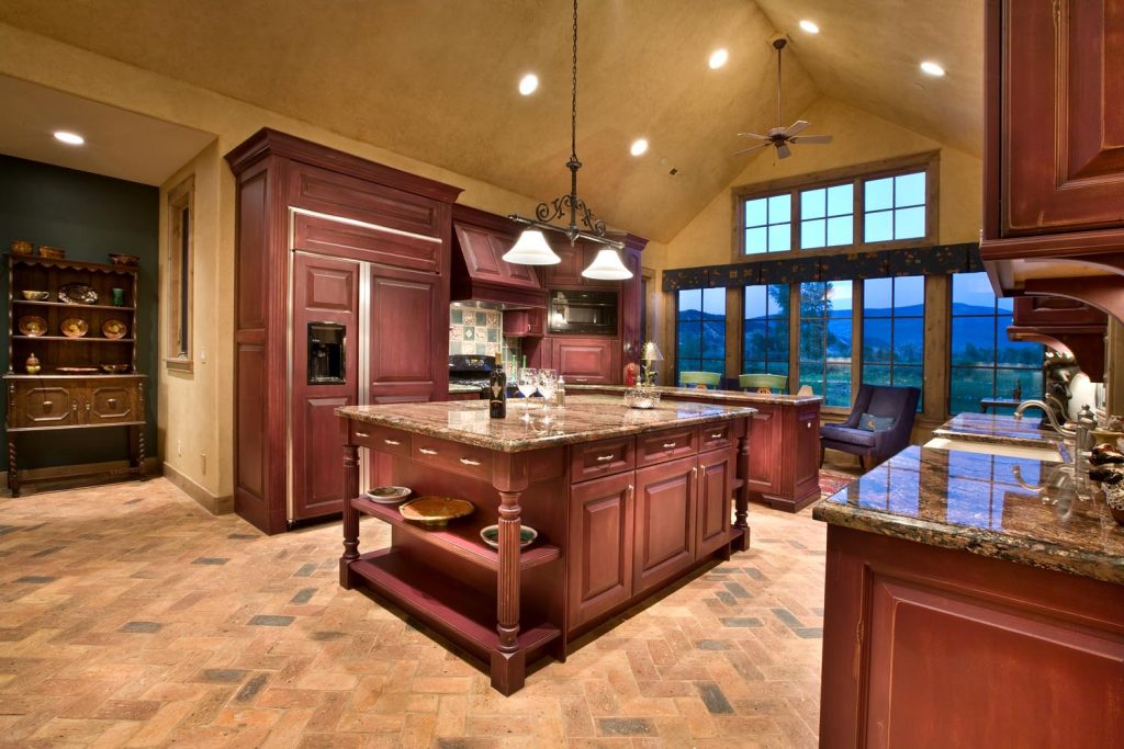 A warm rose-colored wood kitchen