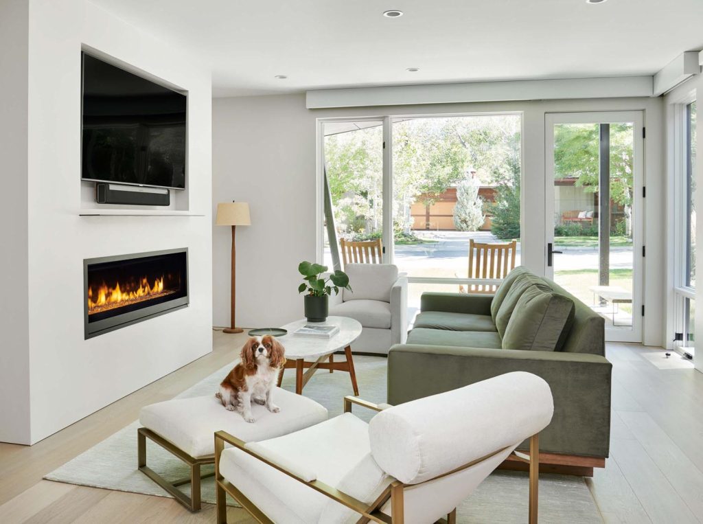 A luxury living room with a fireplace