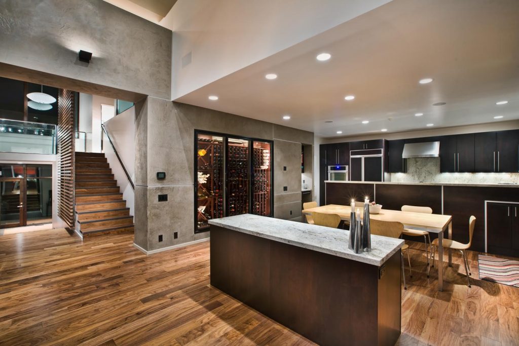 A luxury kitchen with its own wine cellar room