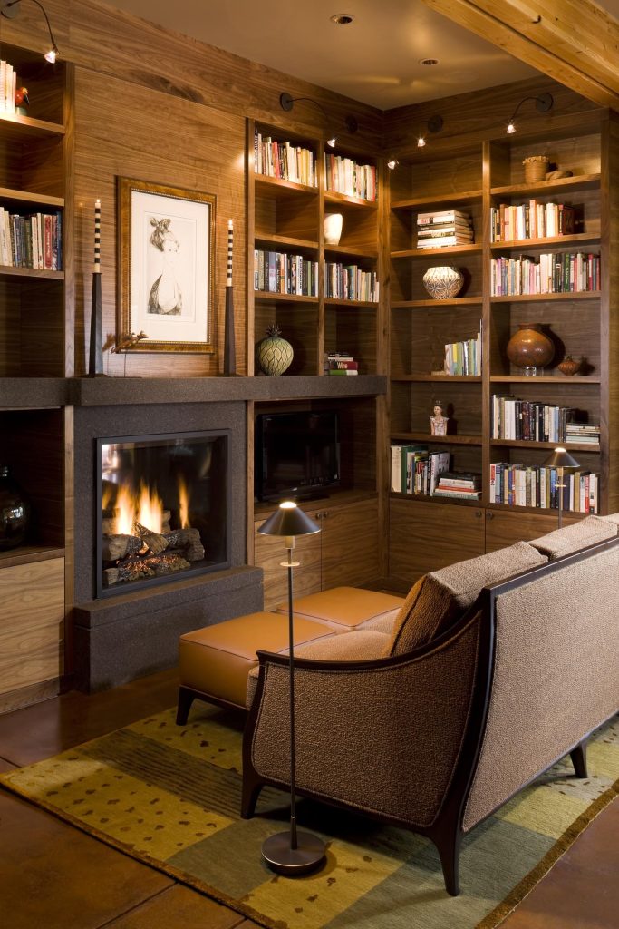 A luxury home with custom shelving for a personal library