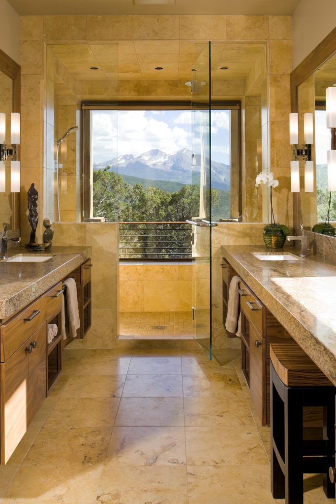 A luxury bathroom with a glass shower