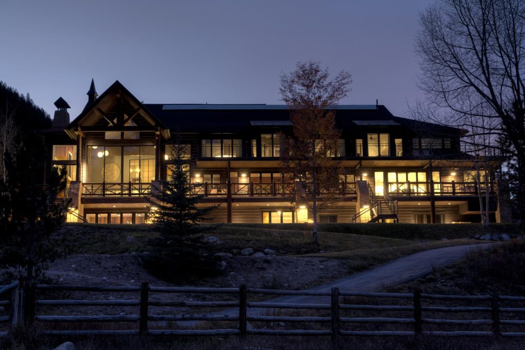 An outdoor luxury home with extensive stairs and balconies