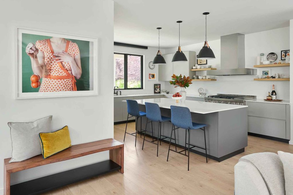 A clean gray kitchen with a spacious island